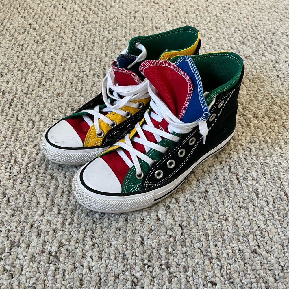 Brand new never worn Chuck Taylor Double Up high tops.   Mens 5 womens 7